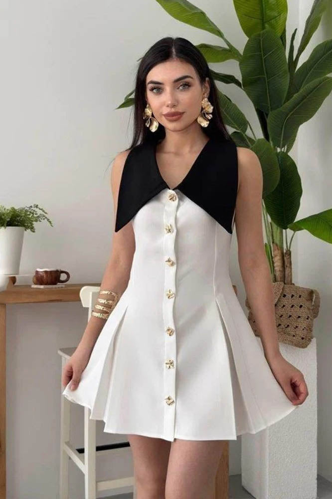 White - Women's pale yellow sleeveless mini dress featuring an oversized pointed collar, metallic button-down front, and a structured pleated skirt.
