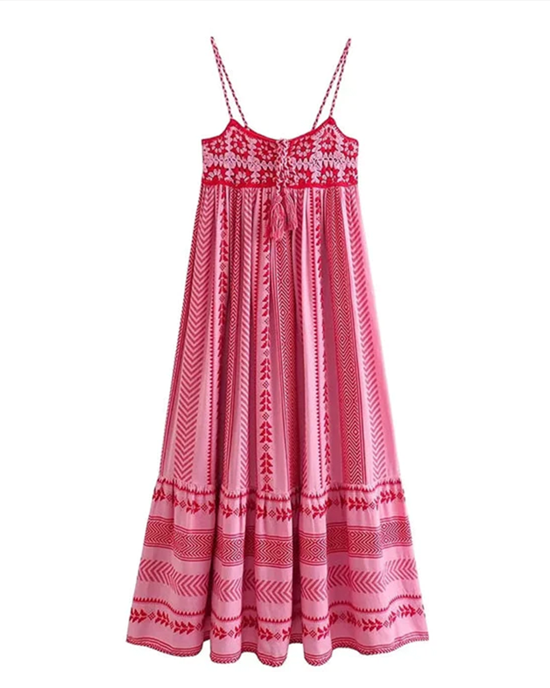 Red - Woman standing in a field of purple flowers wearing a pink and red halter maxi dress with a geometric print, embroidered bodice, and tiered skirt.