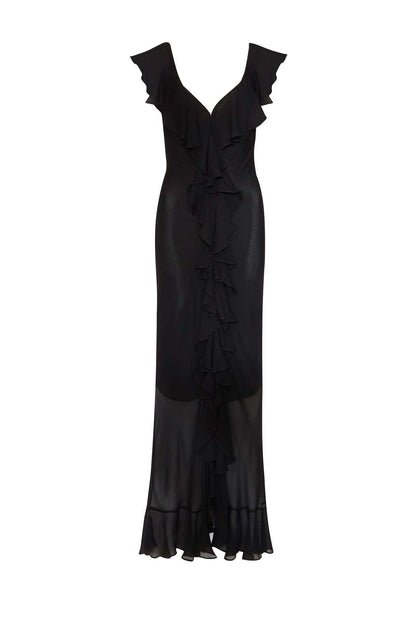 Black - A woman models an elegant, flowing maxi dress featuring a bold floral print, plunging V-neckline, cascading ruffle details down the front, and a high thigh slit.
