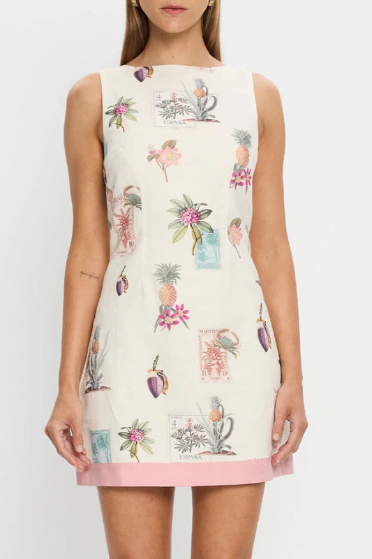 Women's sleeveless mini shift dress in cream featuring a vintage botanical and stamp print with a solid pink contrast hem.