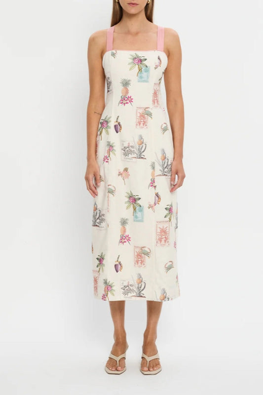 Women's midi-length column dress in cream featuring a vintage botanical stamp print, square neckline, and wide pink shoulder straps.