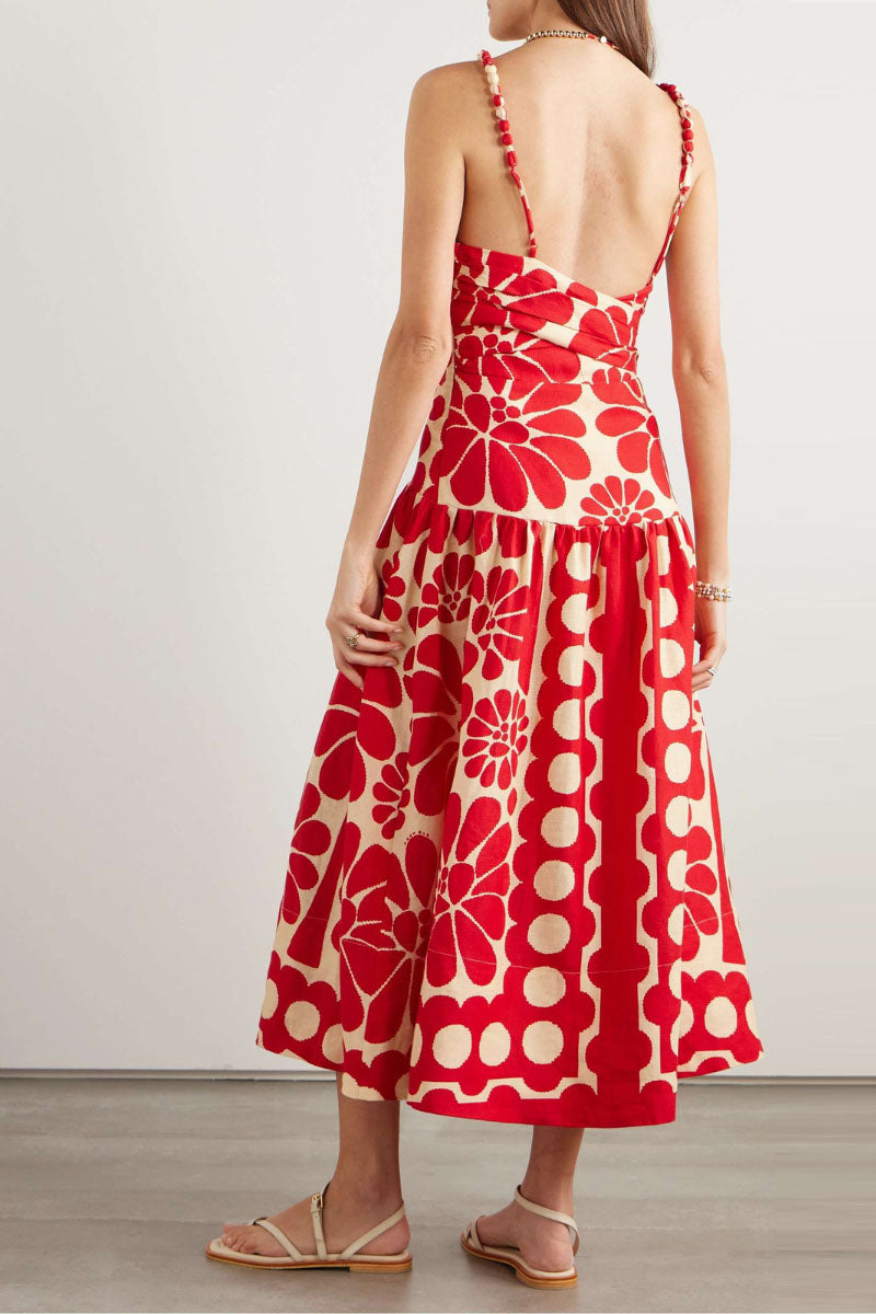 Red - Women's drop-waist midi dress featuring a bold oversized floral print, straight neckline, and artisanal beaded shoulder straps.