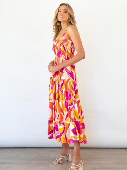 Hot Pink - Women's bright abstract print midi dress featuring a fitted shirred bodice, square neckline, and a flowing tiered skirt.