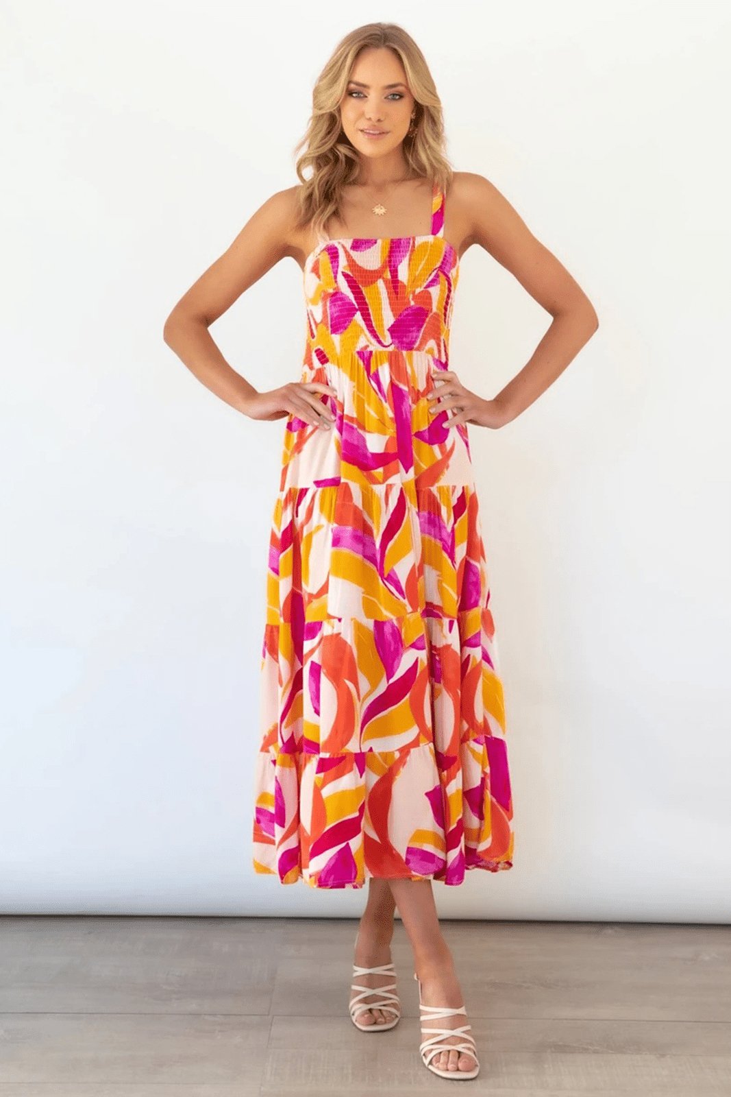 Hot Pink - Women's bright abstract print midi dress featuring a fitted shirred bodice, square neckline, and a flowing tiered skirt.