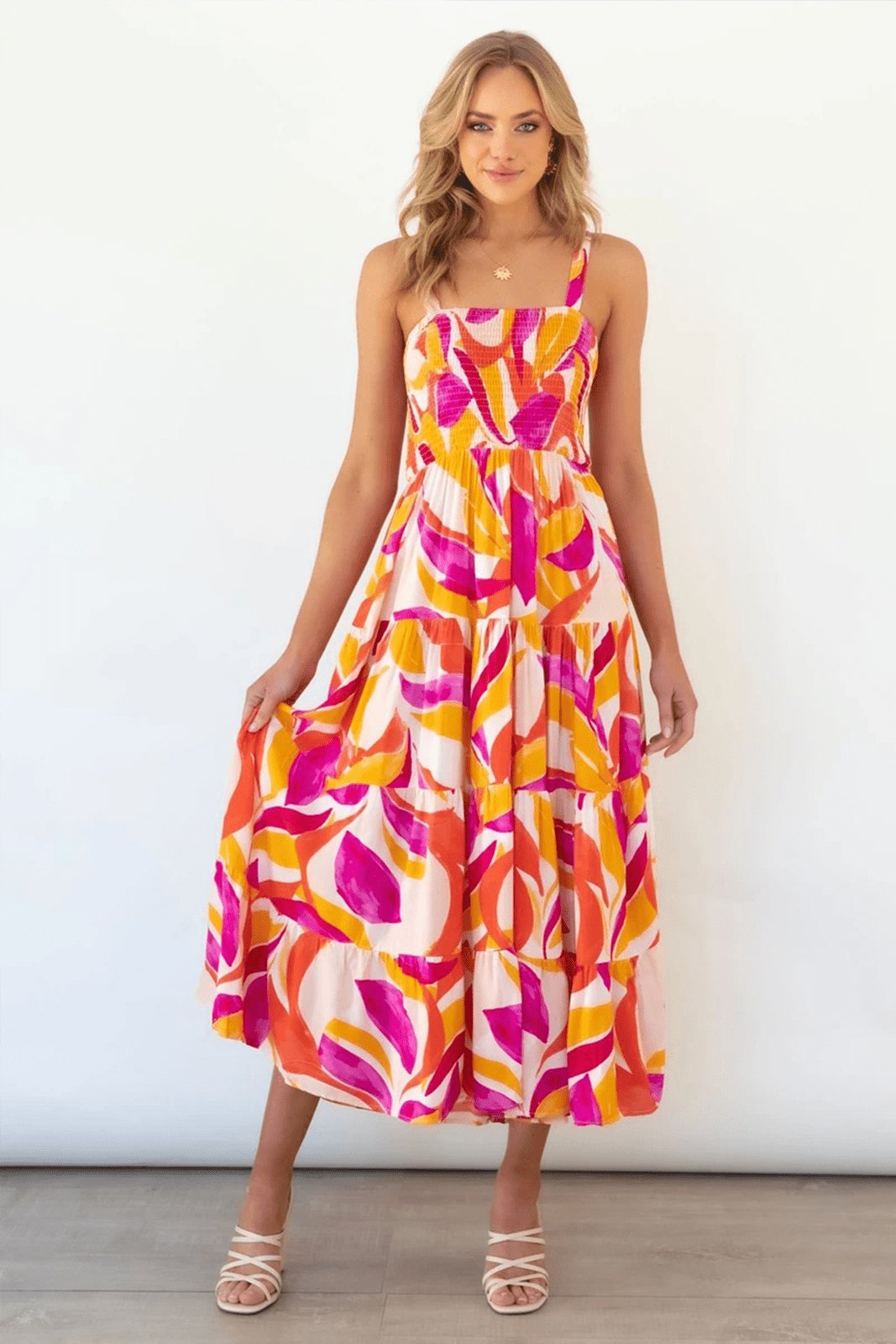 Hot Pink - Women's bright abstract print midi dress featuring a fitted shirred bodice, square neckline, and a flowing tiered skirt.