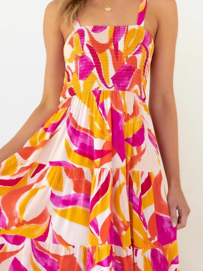 Hot Pink - Women's bright abstract print midi dress featuring a fitted shirred bodice, square neckline, and a flowing tiered skirt.