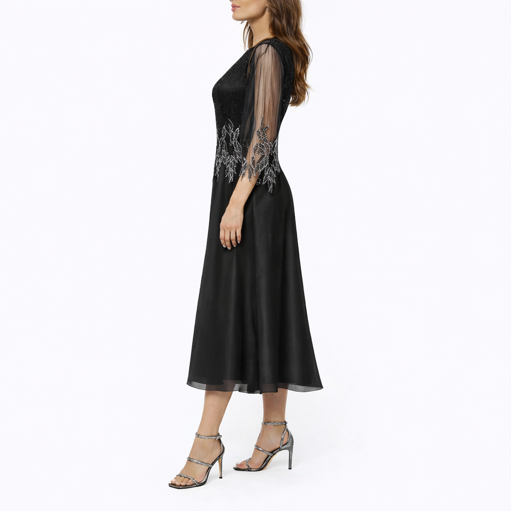 Black - Women's A-line midi dress featuring a sheer chiffon overlay, intricate bodice embellishments, and 3/4-length sleeves