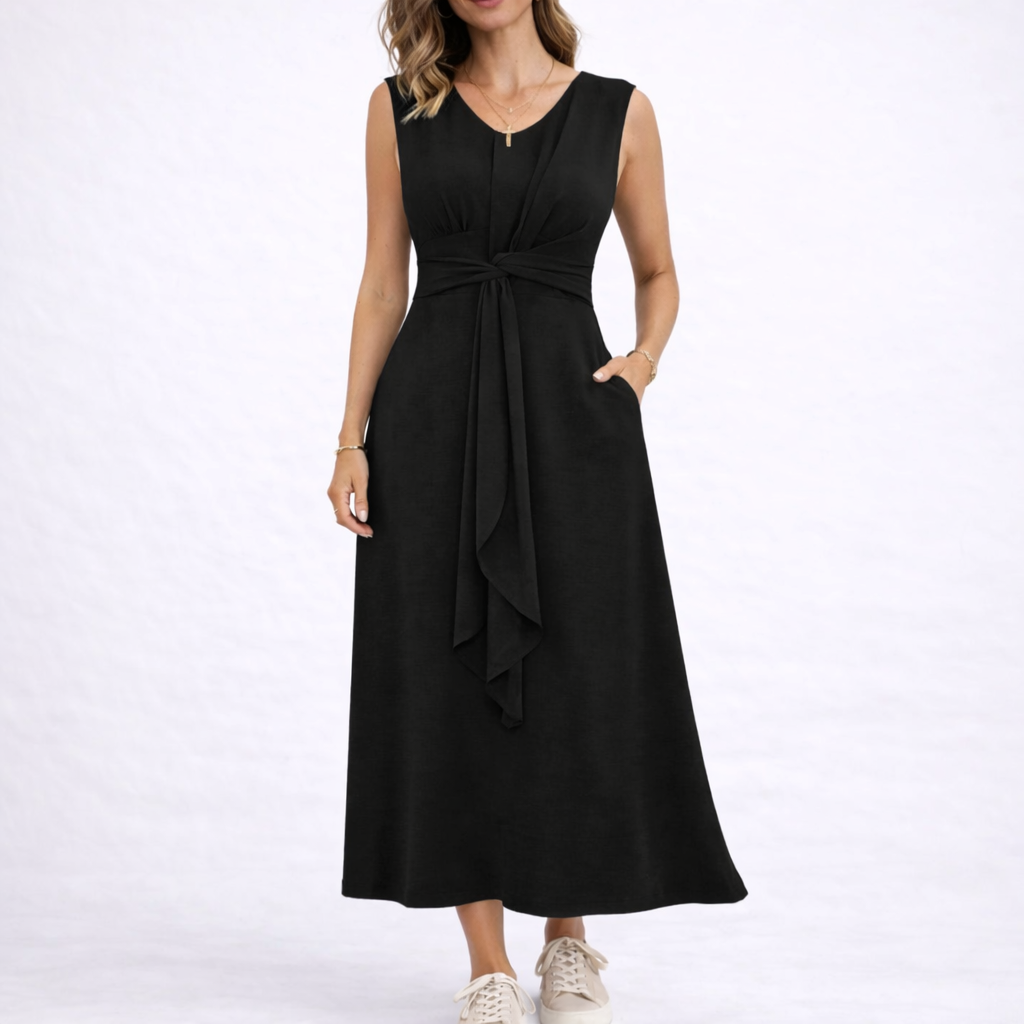 Black - Sleeveless V-neck midi dress featuring a front knot detail and side pockets, styled with trainers on a white background