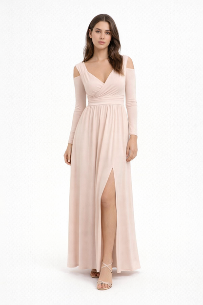 Peach - Woman wearing a solid crepe wrap maxi dress with cold-shoulder long sleeves and a front split.