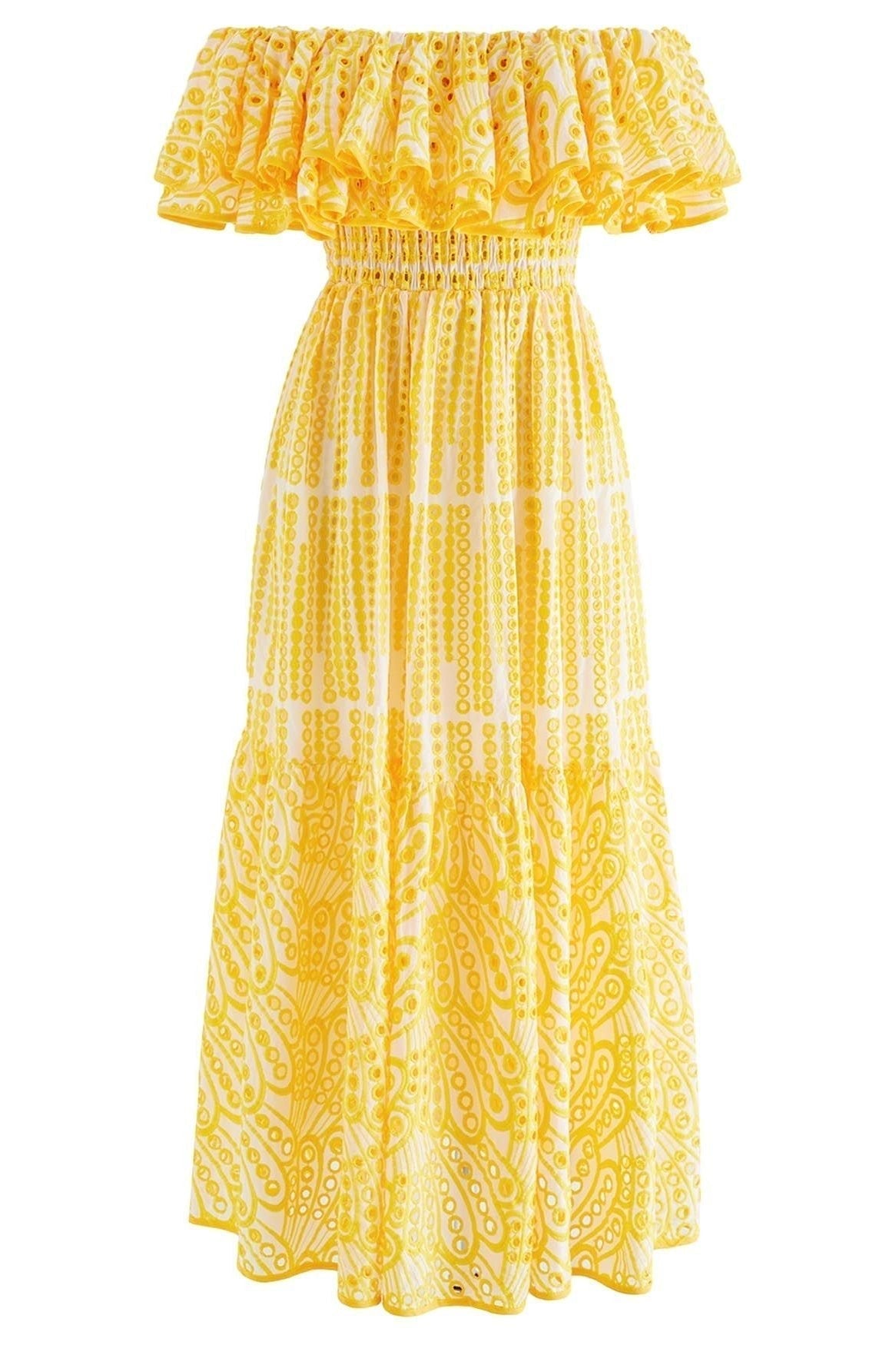 Yellow - A woman wearing a yellow and white off-the-shoulder midi dress featuring a smocked bodice, ruffled neckline, tiered skirt, and intricate broderie anglaise cut-out patterns.