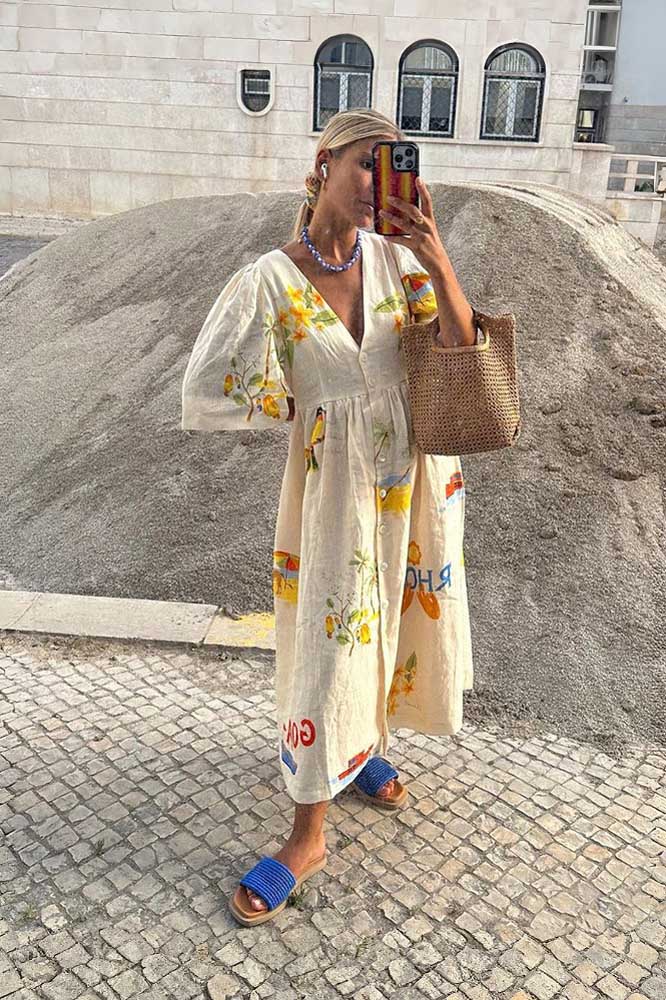White - Women's cream midi dress featuring a colourful scenic tropical print, V-neckline, button-down front, and short flutter sleeves.