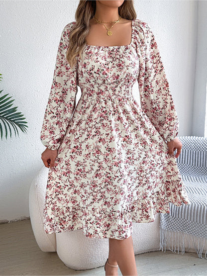 White - Woman wearing a floral square-neck midi dress with long sleeves, a shirred waist, and a ruffled hem
