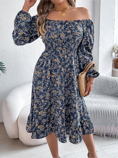 Navy - Woman wearing a floral square-neck midi dress with long sleeves, a shirred waist, and a ruffled hem