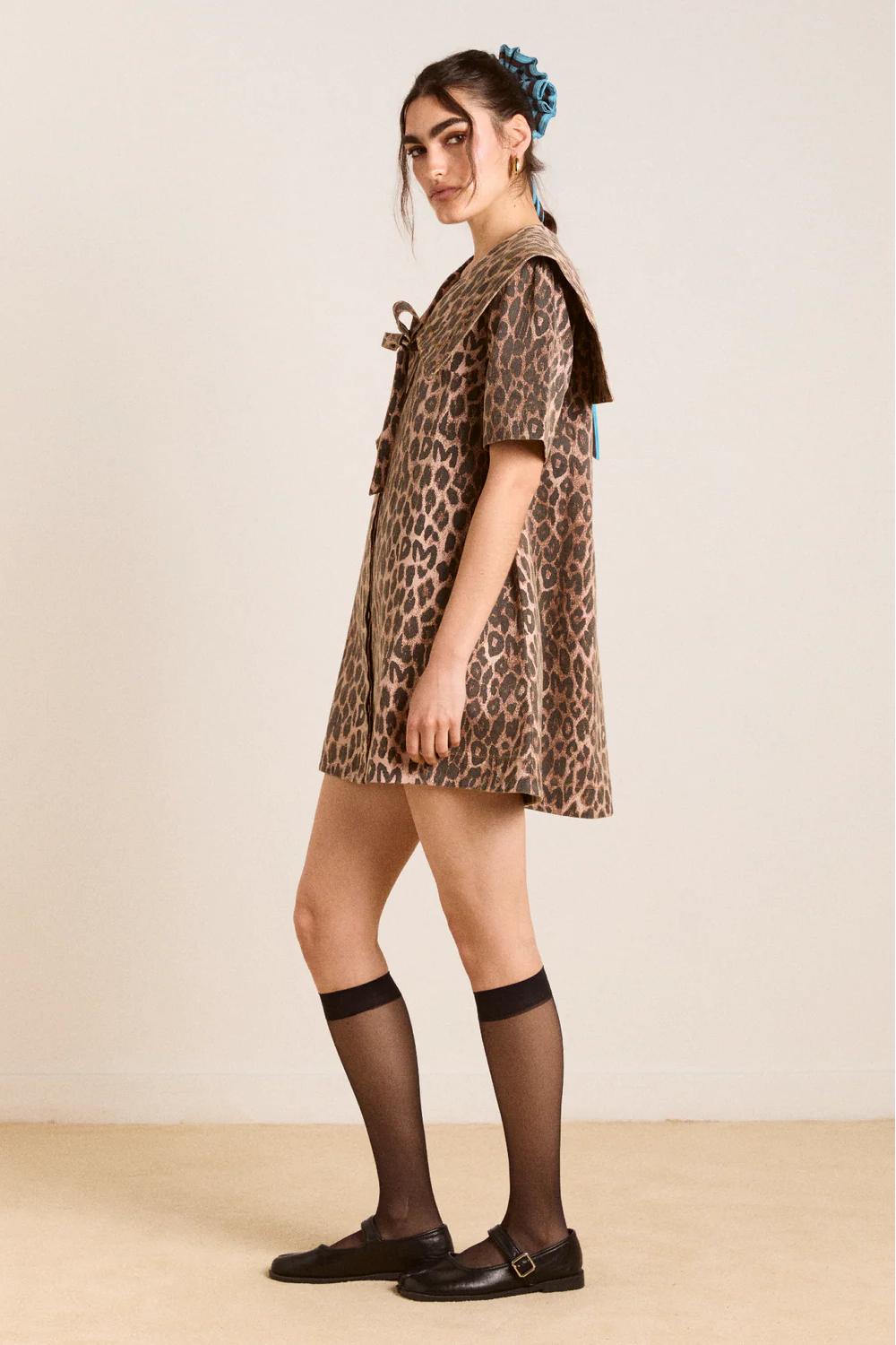 Leopard - Women's structured mini shift dress featuring an oversized collar with a tie-front detail, short sleeves, and an all-over leopard print.