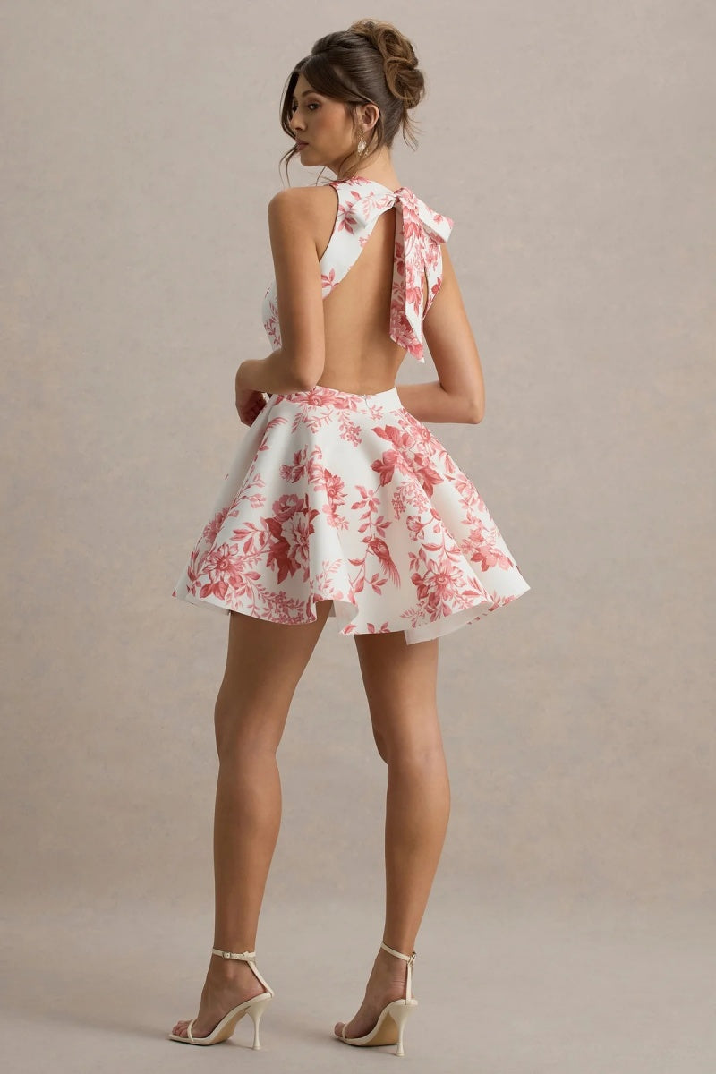 Pink - Women's high-neck sleeveless mini dress featuring a fitted bodice, dramatically flared skirt, and a pink botanical floral print on a white background.
