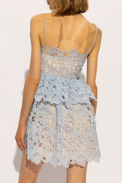 Blue - Women's light blue mini dress featuring intricate floral cutwork lace over a nude lining, embellished spaghetti straps, and a tiered fit-and-flare silhouette.