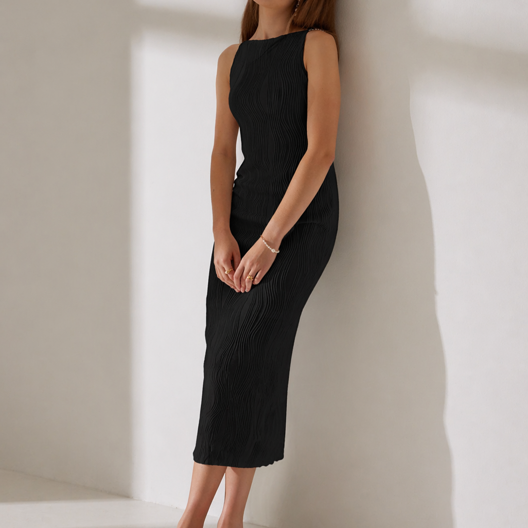 Black - Model wearing a sleeveless plisse midi dress with a high neckline and textured finish against a light grey background.