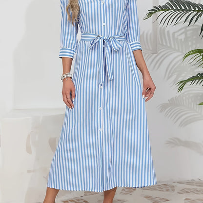 Light Blue - Woman wearing a striped poplin midi shirt dress with 3/4 sleeves, a collared neckline, and a tie waist, styled with white trainers.