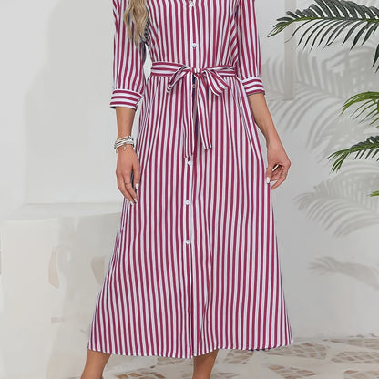 Red - Woman wearing a striped poplin midi shirt dress with 3/4 sleeves, a collared neckline, and a tie waist, styled with white trainers.