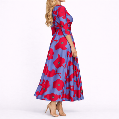 Red & Blue - Woman wearing a long satin floral maxi dress with 3/4 sleeves, a V-neckline, and a sweeping A-line skirt.