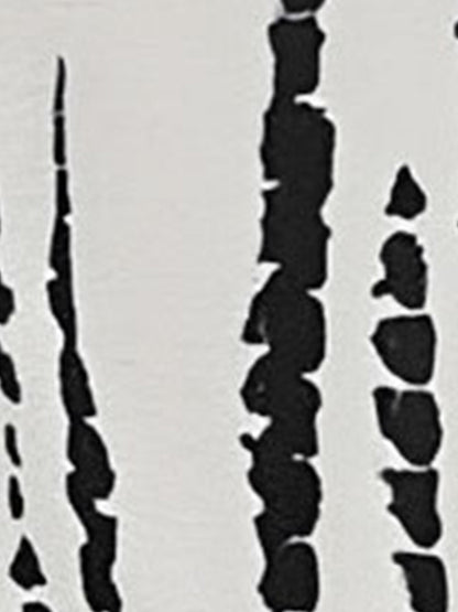 White - Model wearing a lightweight woven strappy midi dress with an abstract vertical pattern, adjustable waist tie, and side split, standing outdoors against a white textured wall.