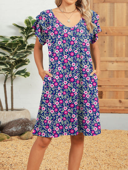 Pink - Woman wearing a lightweight woven animal-print shift dress with a V-neckline and short flutter sleeves, styled with a woven bag.