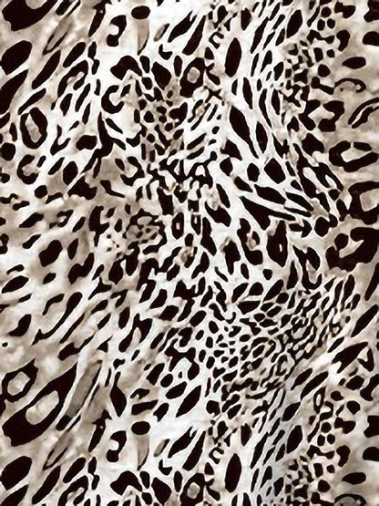 Leopard - Woman wearing a lightweight woven animal-print shift dress with a V-neckline and short flutter sleeves, styled with a woven bag.