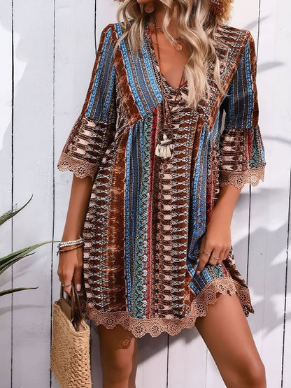 Coffee - Woman wearing a patterned V-neck mini dress with 3/4 sleeves and lace trim detailing