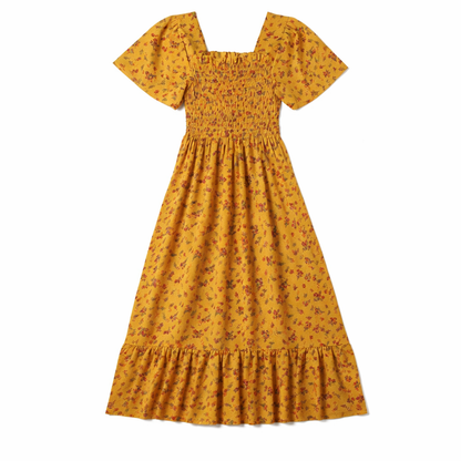 Yellow - Model wearing a woven floral square-neck midi dress with a smocked bodice, short sleeves, and a ruffle hemline.