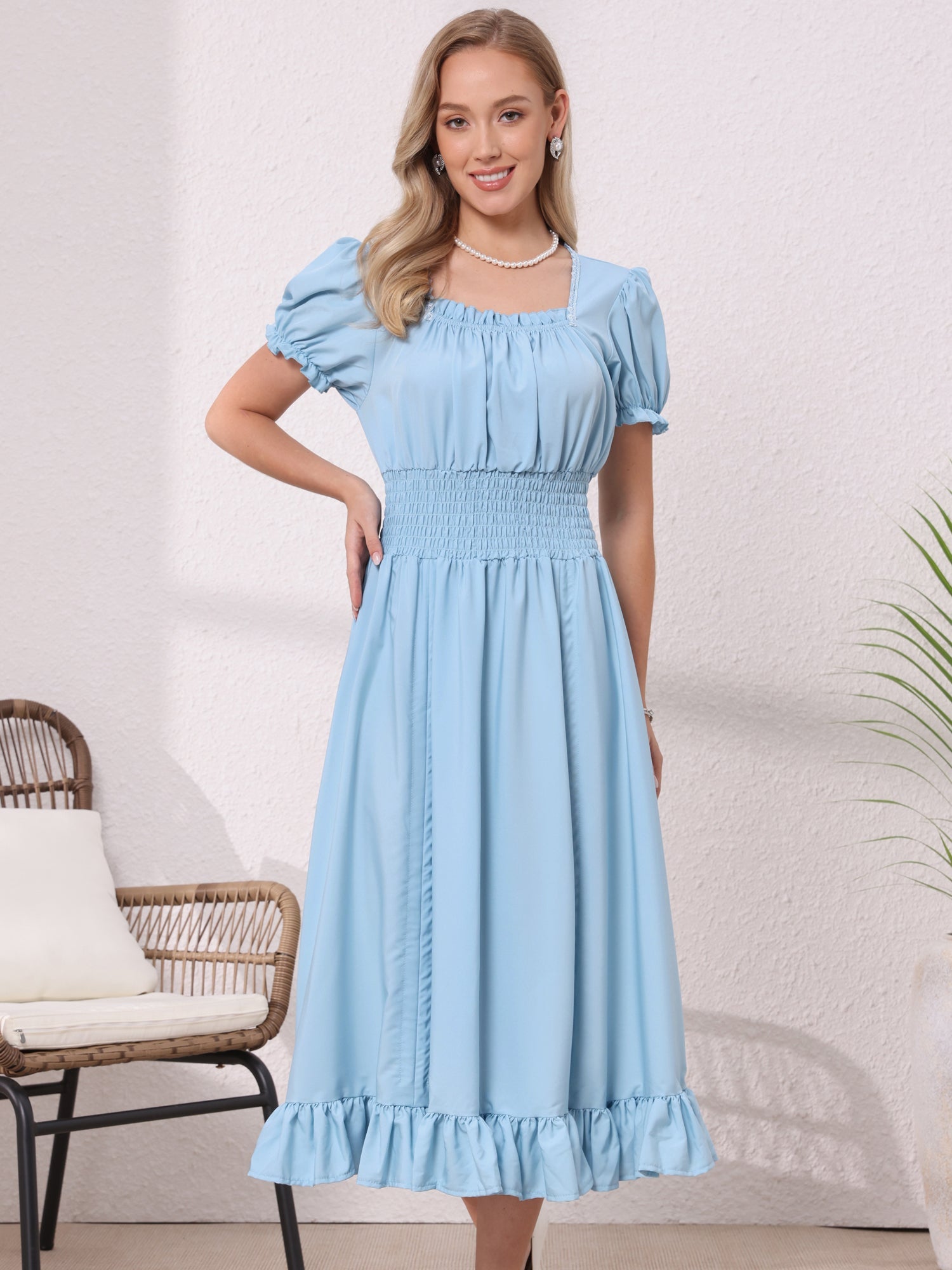 Light Blue - Model wearing a solid woven midi dress featuring a square neckline, short puff sleeves, a wide smocked waist, and a dramatic ruched front with an asymmetrical ruffled hem.