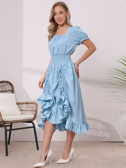 Light Blue - Model wearing a solid woven midi dress featuring a square neckline, short puff sleeves, a wide smocked waist, and a dramatic ruched front with an asymmetrical ruffled hem.