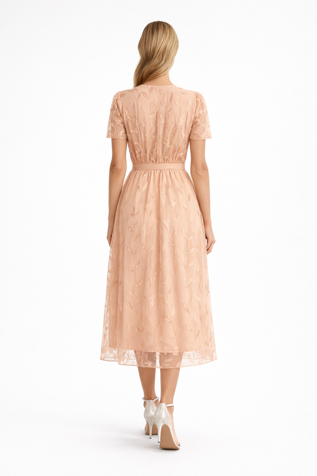 Peach - Woman wearing a woven wrap-style midi dress with short sheer sleeves, a tie waist, and a textured overlay, standing against a white background.